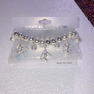 Brand new never been worn girls soccer bracelet.